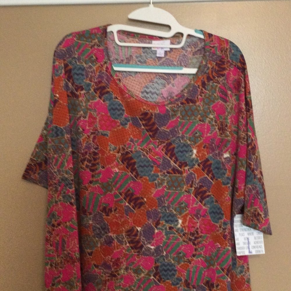 NWT Lularoe Irma Shirt, size Large. Candy pattern in pink, purple, green, orange
